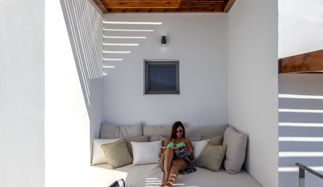 villa-empeiria-paleros-greece-girl-relaxing-on-day-bed