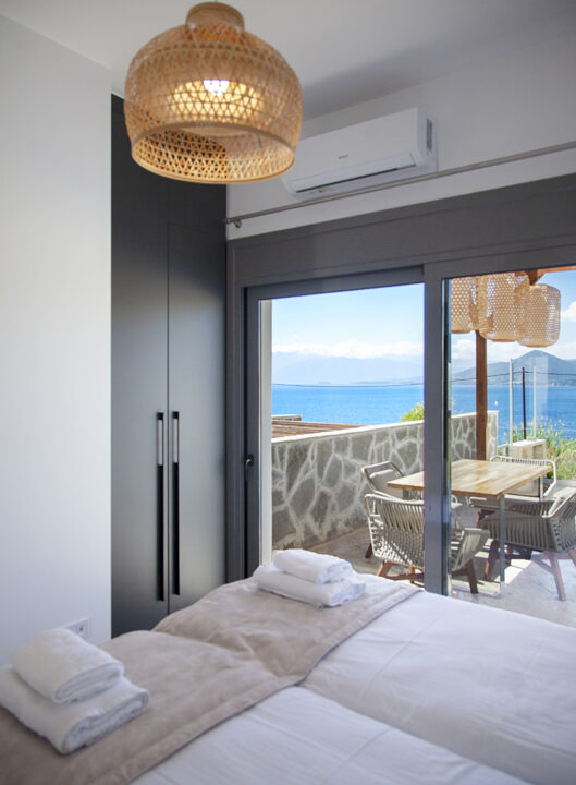 villa-petalouda-paleros-greece-bedroom-with-sea-view