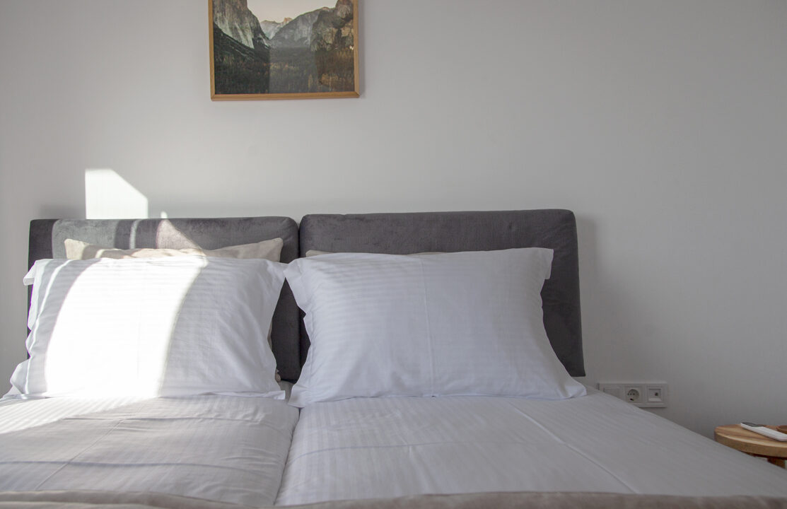 villa-petalouda-paleros-greece-bedroom-with-sunlight