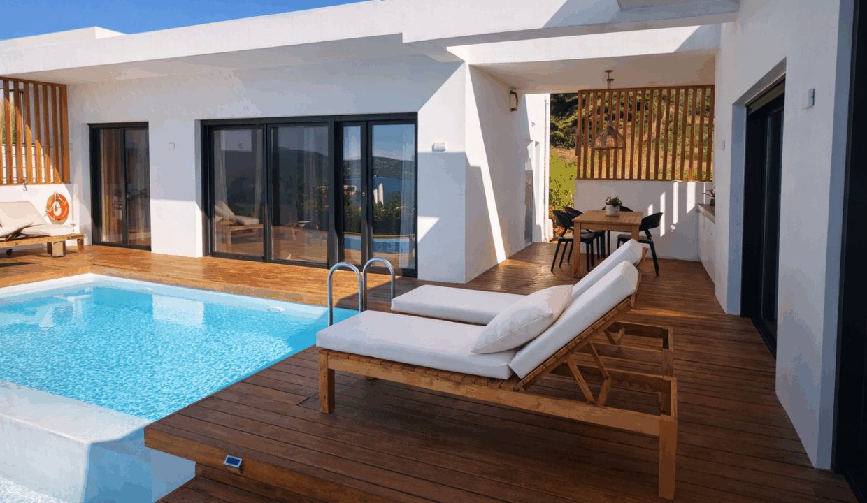 Modern poolside retreat with outdoor dining